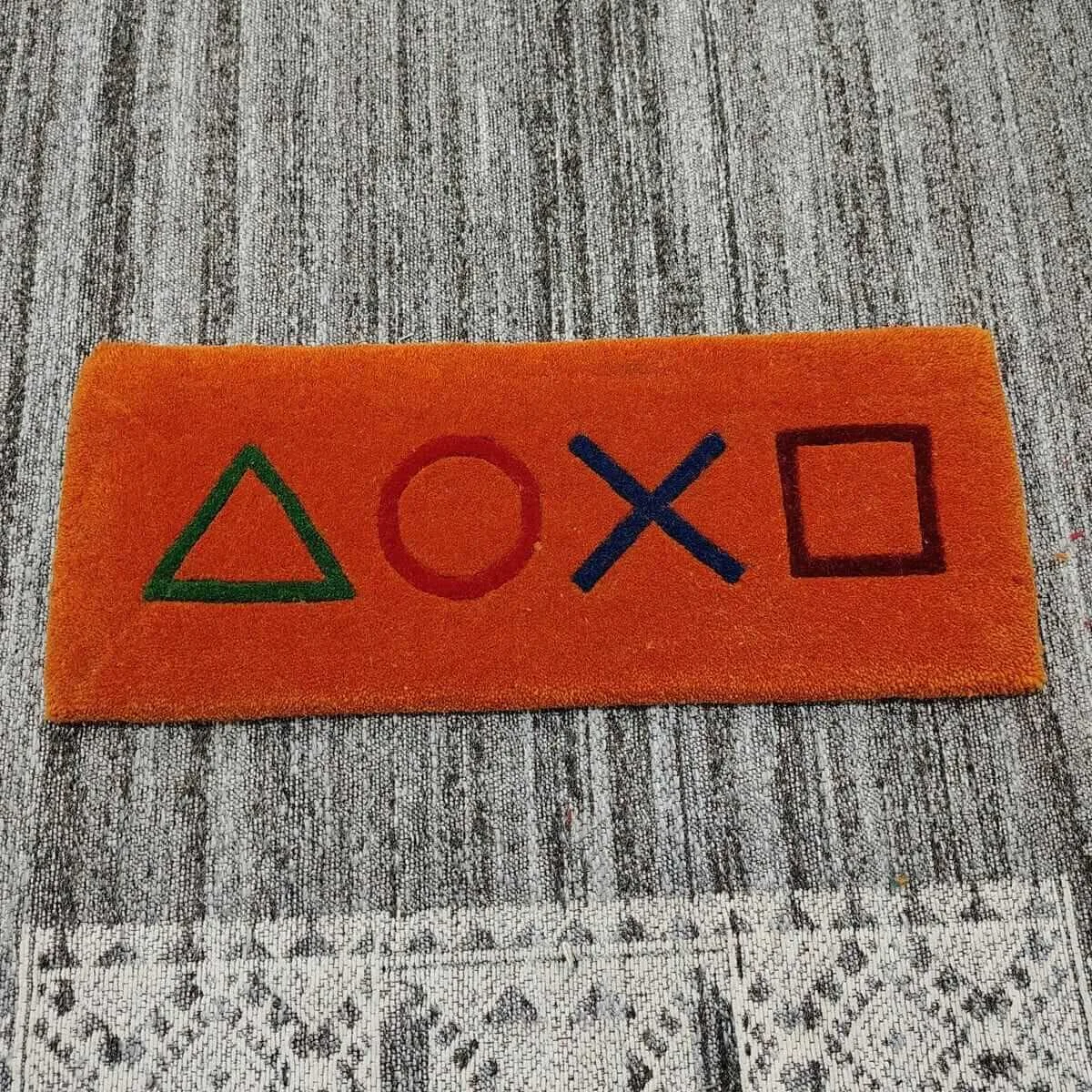 Orange Gaming Console Icons Keyboard Rug — Closeup view