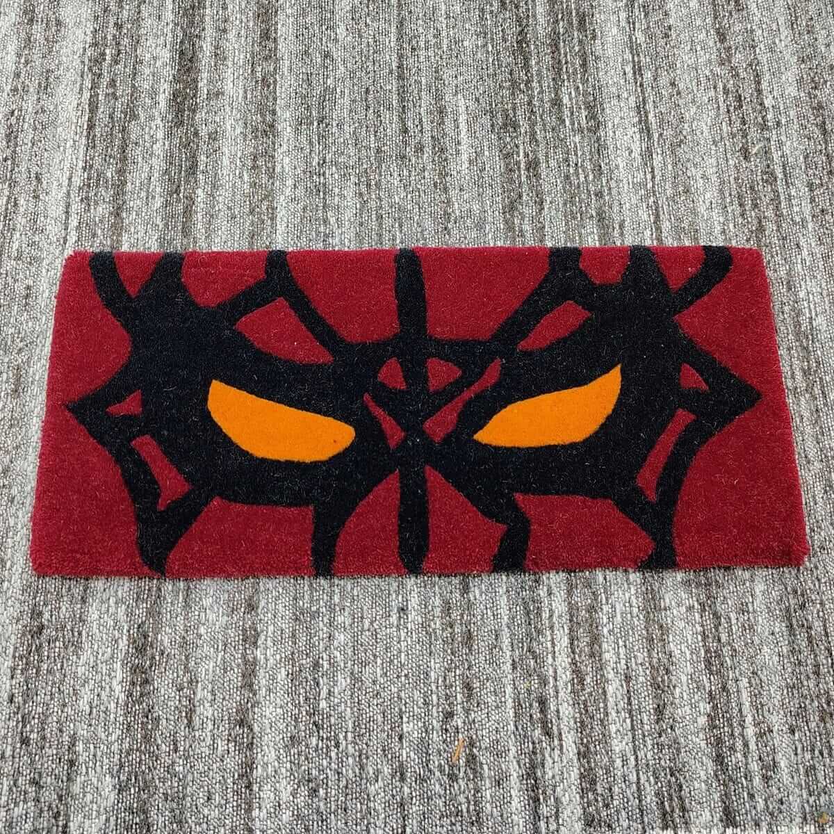 Red Web Hero Mask Keyboard Rug — Closeup view