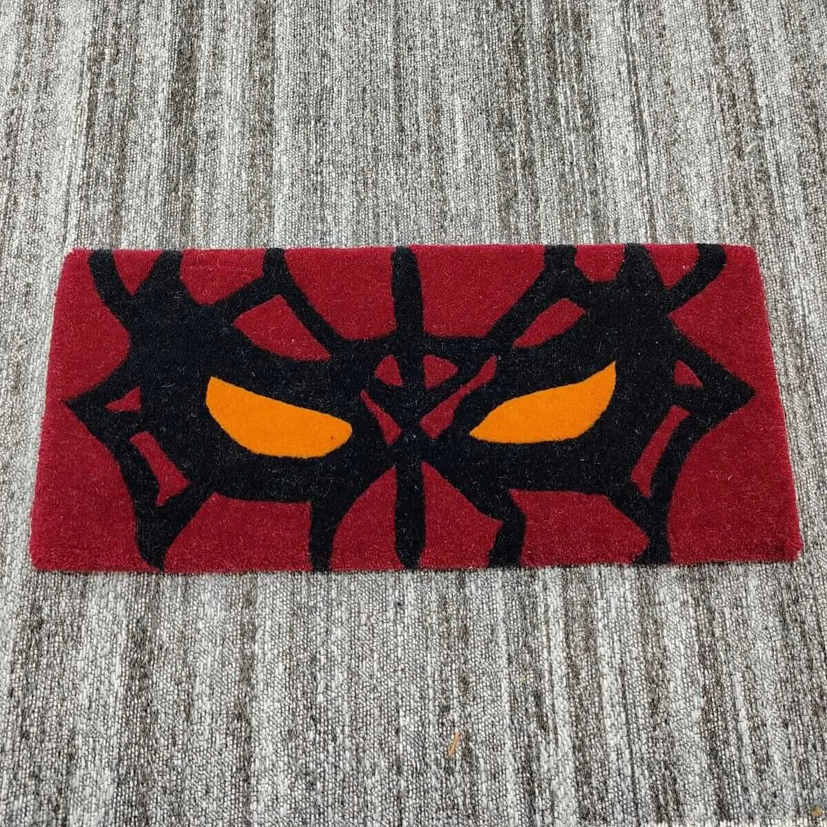 Red Web Hero Mask Keyboard Rug — Closeup view